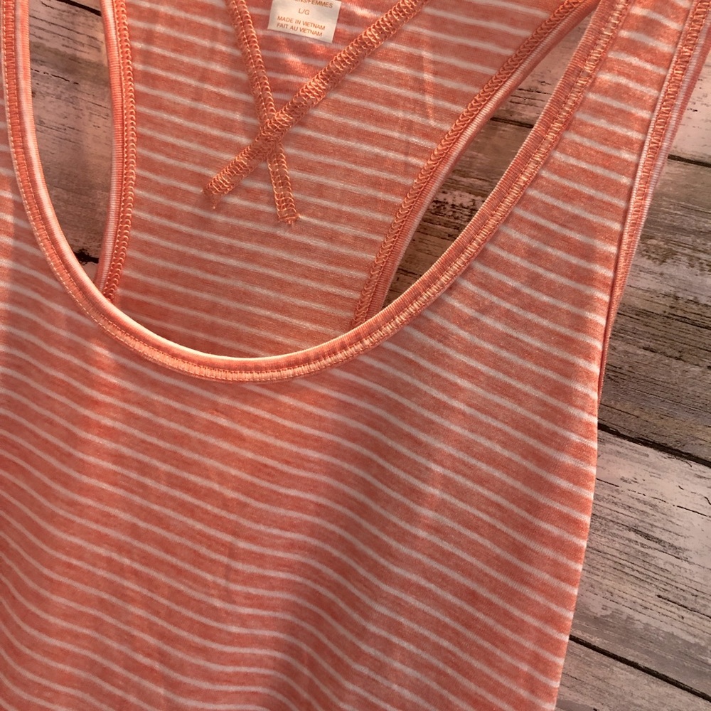 Lucy orange abs shite tank top. Large.